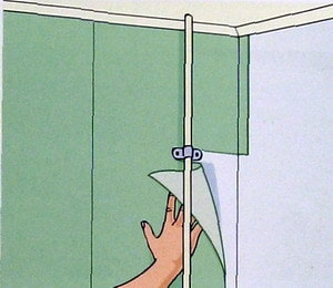 pose de papier peint derrière les tuyaux