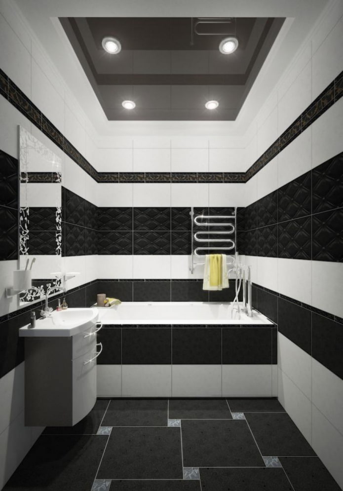 Finition carrelage noir et blanc dans la salle de bain