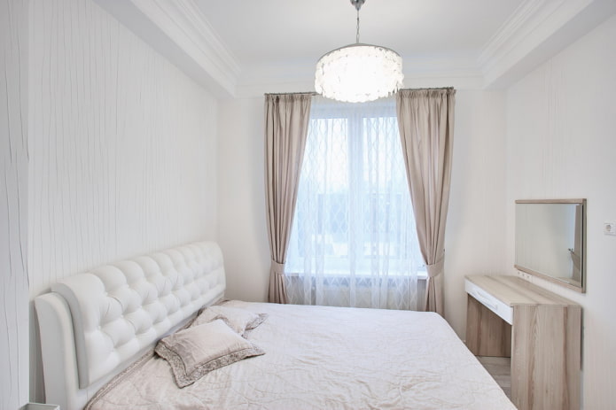 Éclairage d'une chambre à coucher dans les tons blancs