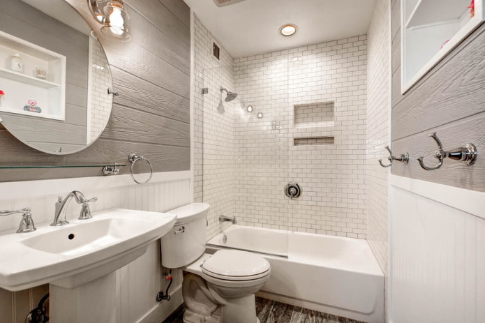 intérieur de salle de bain dans les tons blancs et gris