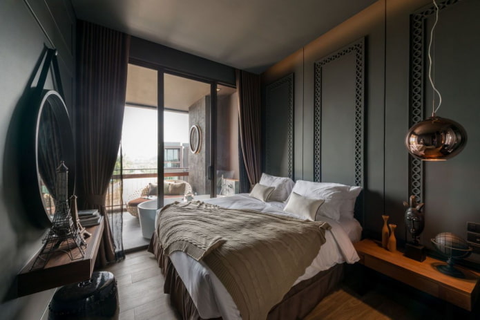 Textiles dans une chambre à coucher aux tons noirs