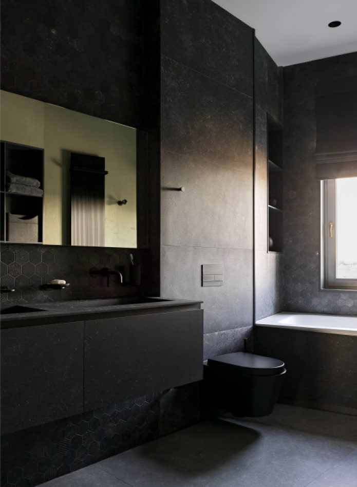 meubles noirs dans la salle de bain