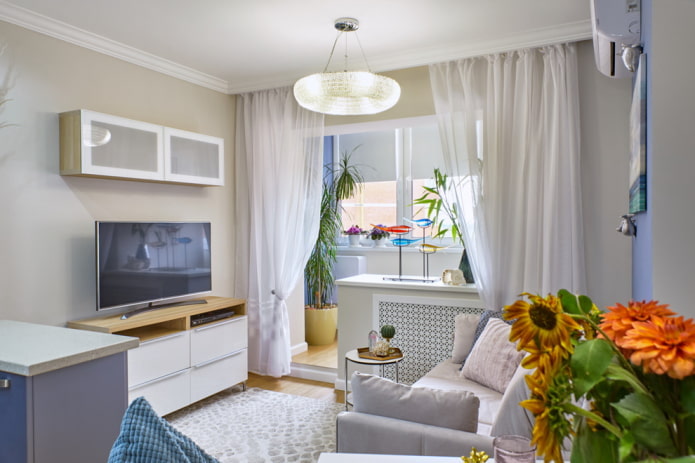 Salon combiné avec un balcon