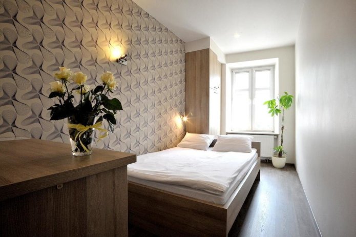 Exemple de disposition des meubles dans une chambre rectangulaire