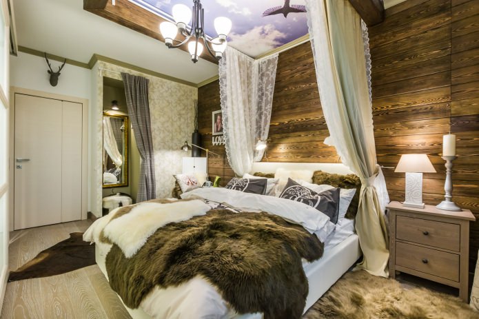Chambre avec un mur en bois