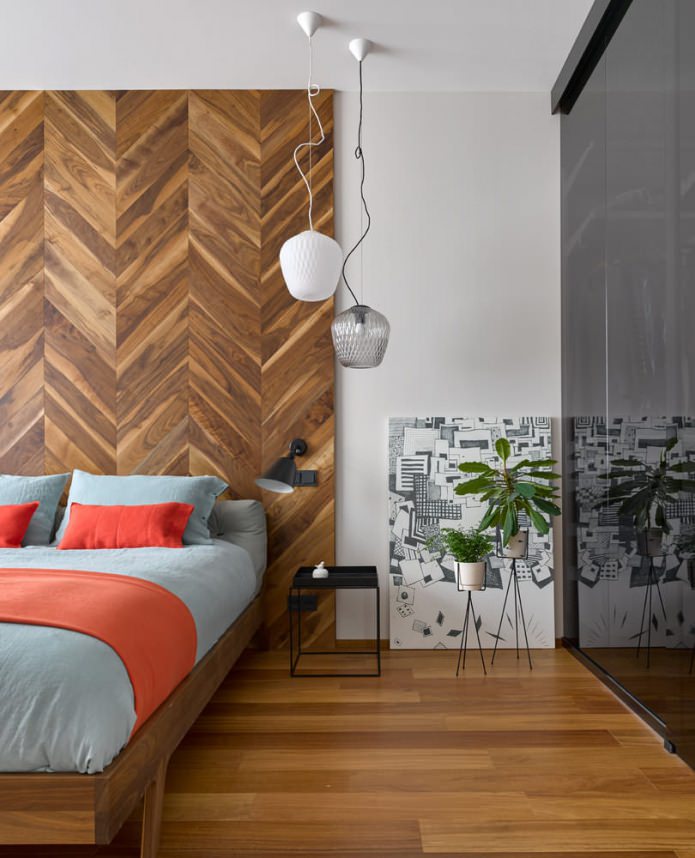 Chambre avec un mur en bois