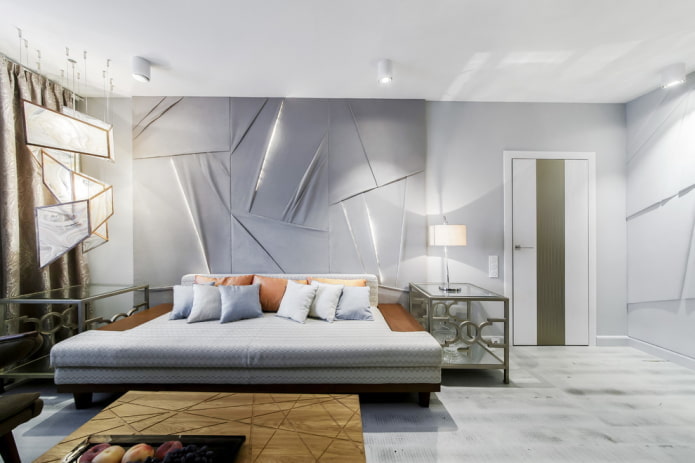 Éclairage et décoration dans l'intérieur d'un salon gris