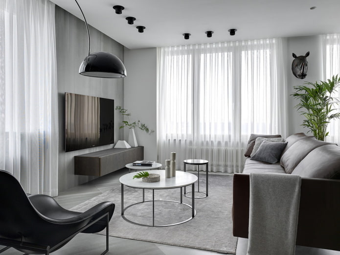 Intérieur de salon dans les tons gris et blancs