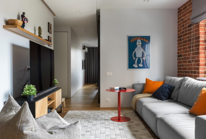 intérieur gris avec coussins en terre cuite