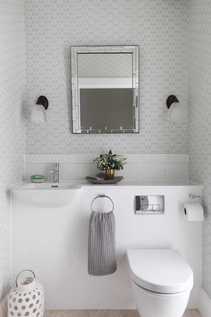 toilettes grises et blanches
