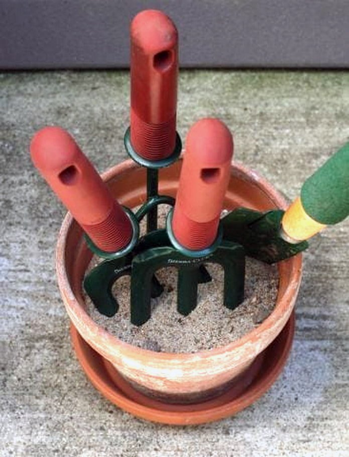 Inventaire dans un pot avec du sable
