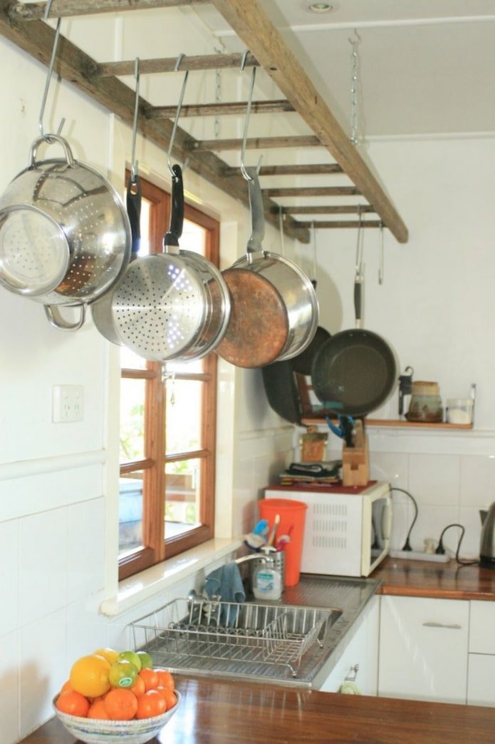 Cadre pour poêles à frire sur échelle