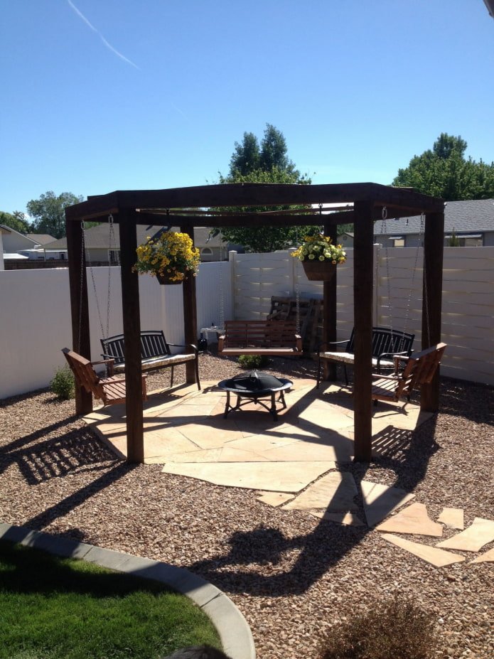 gazebo avec balançoire et cheminée
