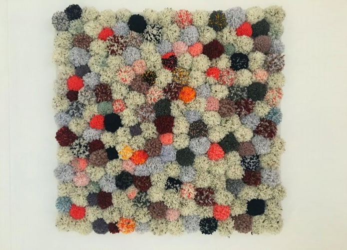 Tapis fait de vieux objets