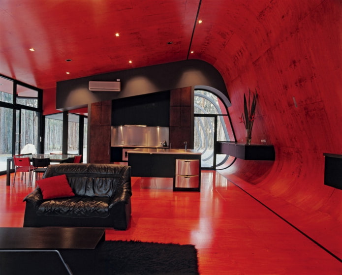 Murs et plafond rouges avec meubles noirs