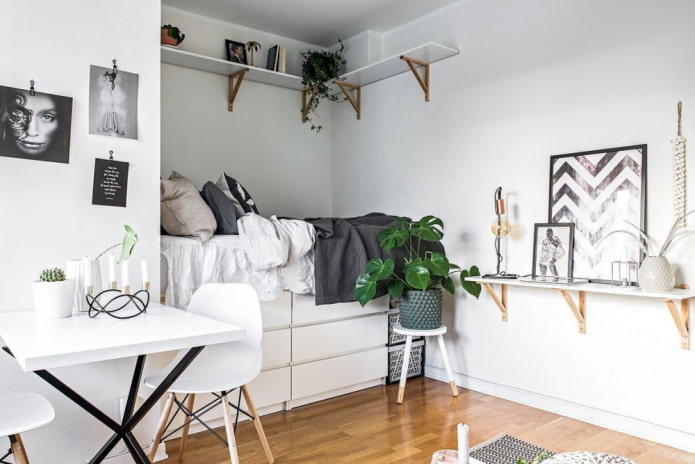 niche avec un lit dans un intérieur de style scandinave