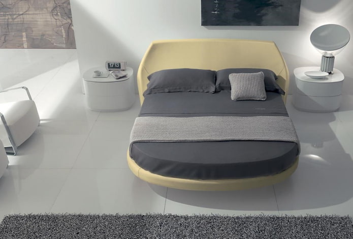 Lit semi-circulaire dans une chambre