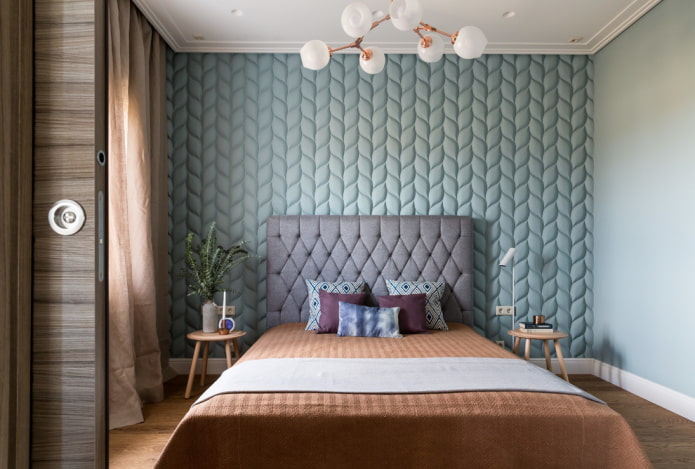 lit avec une tête de lit moelleuse dans un style moderne