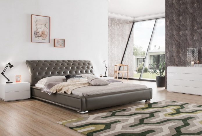 lit avec tête de lit courbée à l'intérieur