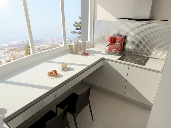 Aménagement de cuisine avec coin repas sur le balcon