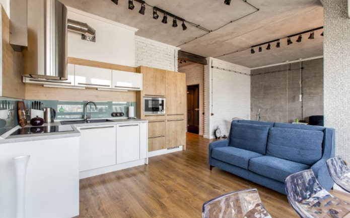 Canapé dans une cuisine de style loft