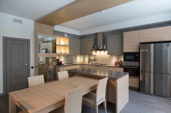 Îlot central avec table à manger dans la cuisine