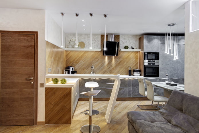 intérieur d'une cuisine-studio avec comptoir de bar