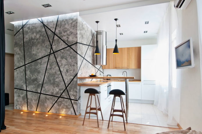 intérieur d'une cuisine-studio avec comptoir de bar