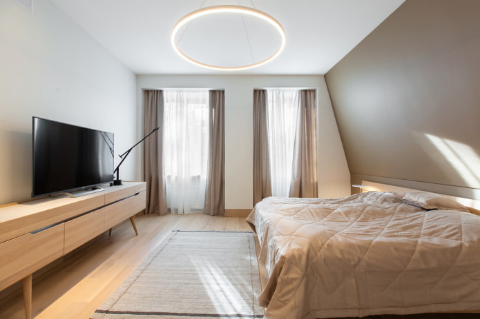 Lustre au plafond d'une chambre de style moderne