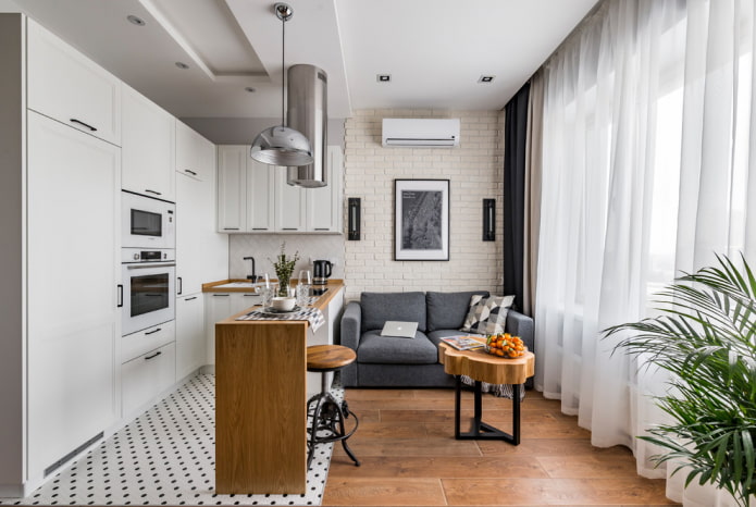 ensemble à l'intérieur d'une petite cuisine-salon