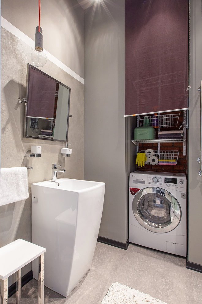 niche avec machine à laver dans la salle de bains
