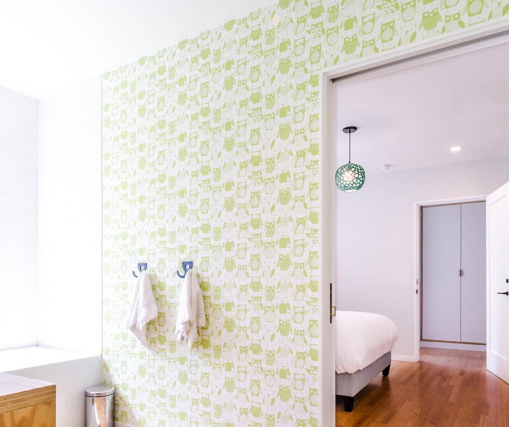 Papier peint avec des hiboux verts