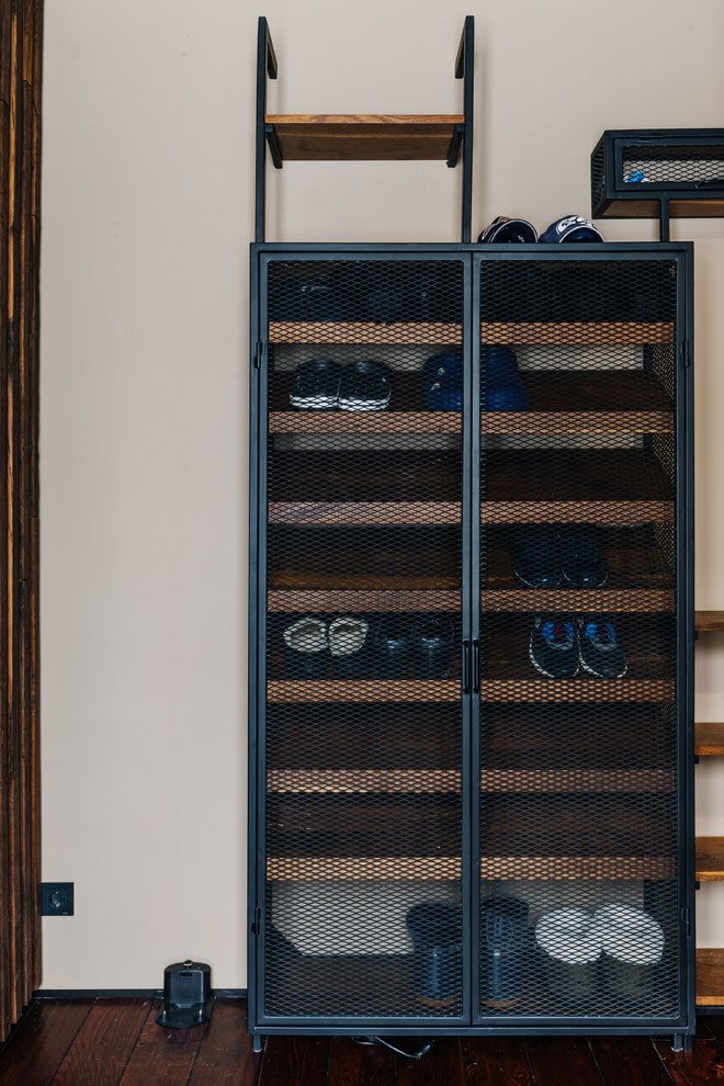 Meuble à chaussures dans un couloir de style loft