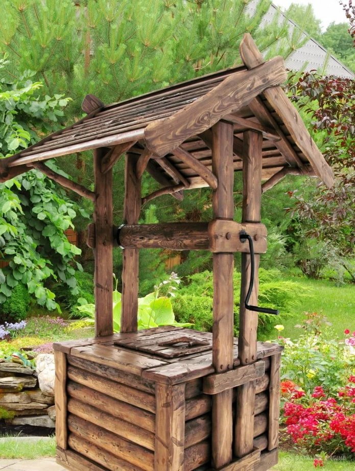 Magnifique puits en bois