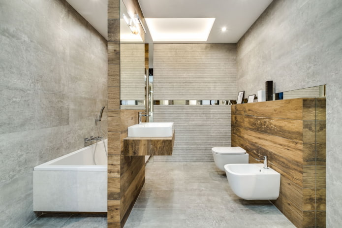 Combinaison de carrelage imitation bois et de béton dans une salle de bain