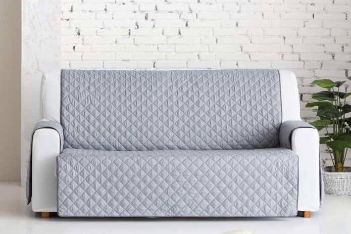 couvre-lit matelassé pour un canapé à l'intérieur