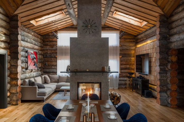 cheminée en béton dans une maison en bois