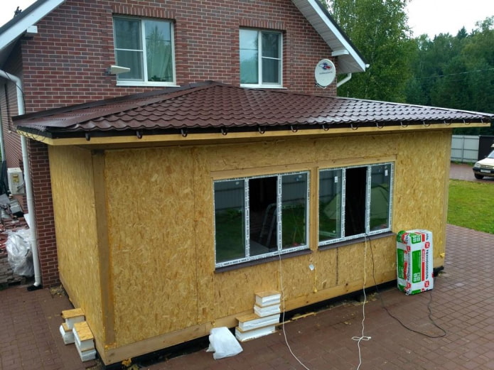 extension d'une maison en briques en panneaux SIP