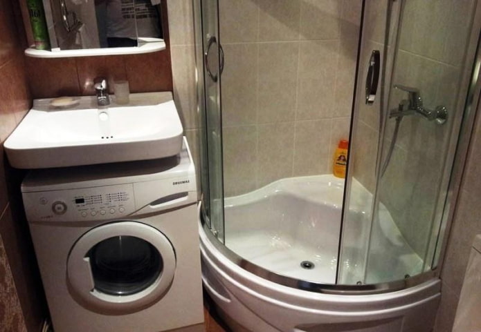 cabine de douche et lave-linge sous le lavabo
