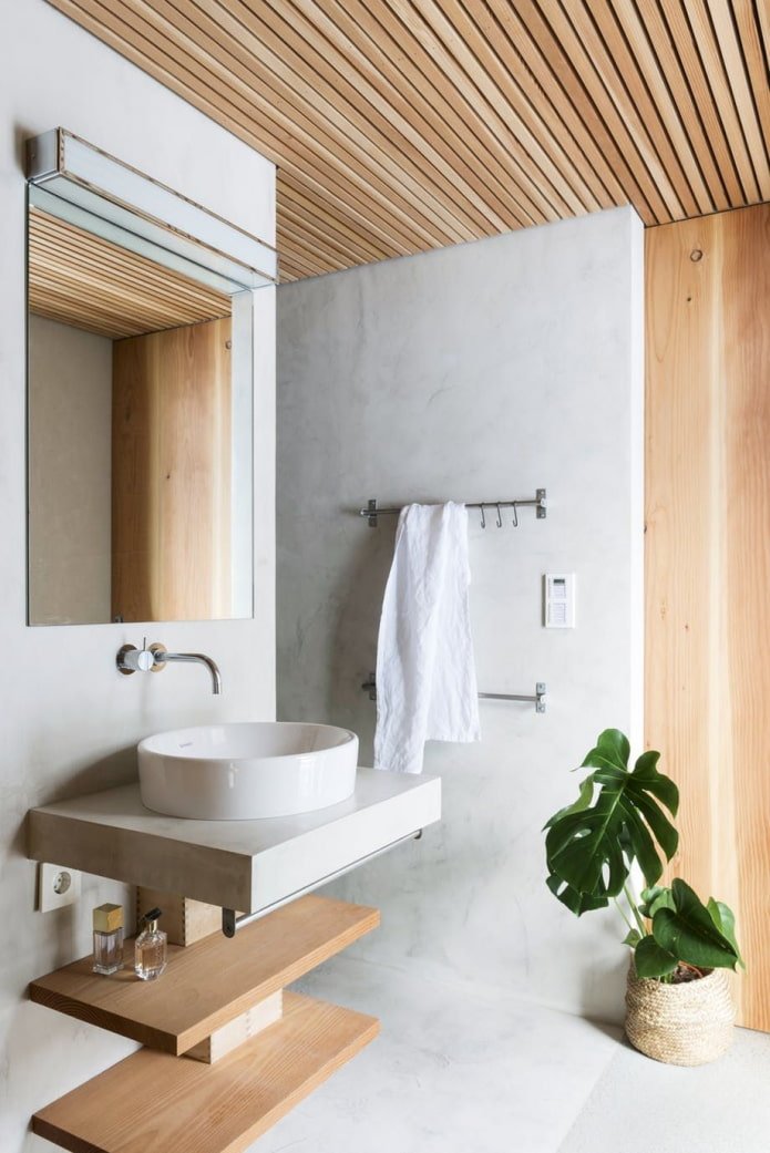 béton et bois dans la salle de bain