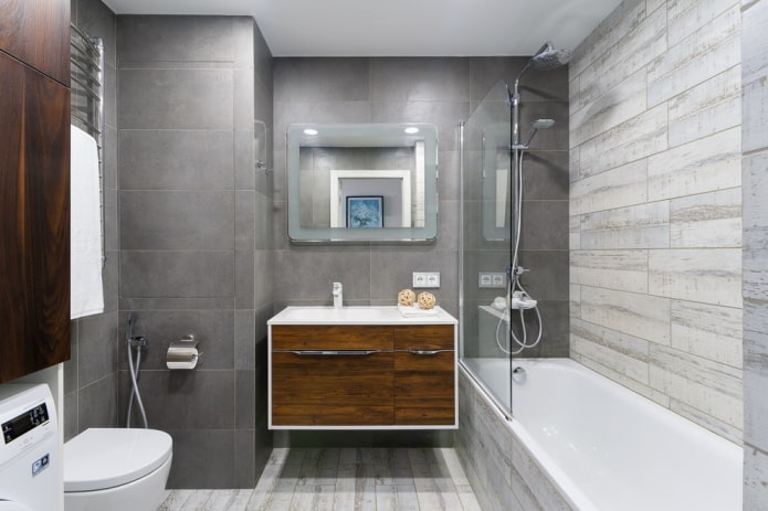 Intérieur de salle de bain dans les tons blancs et gris