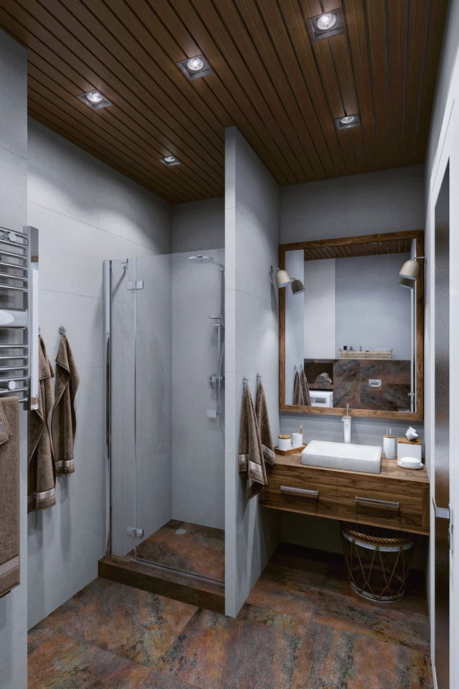 Intérieur de salle de bain dans les tons gris-brun