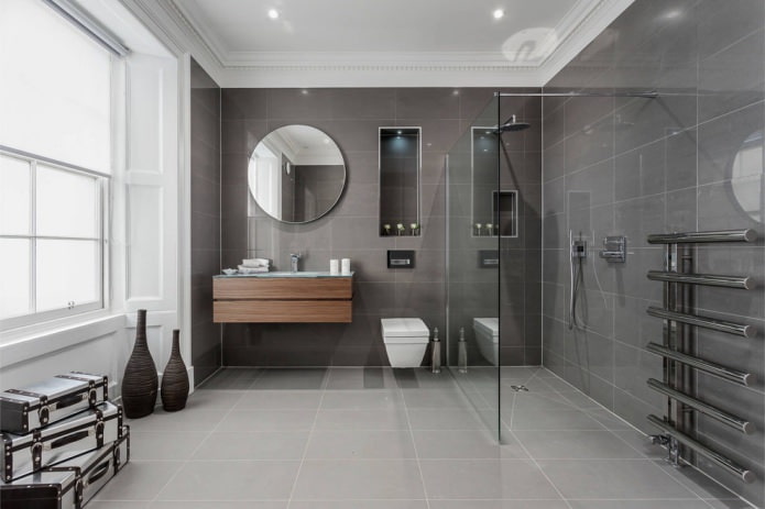Intérieur de salle de bain moderne avec carrelage gris rectangulaire