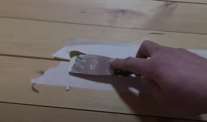 application du mastic