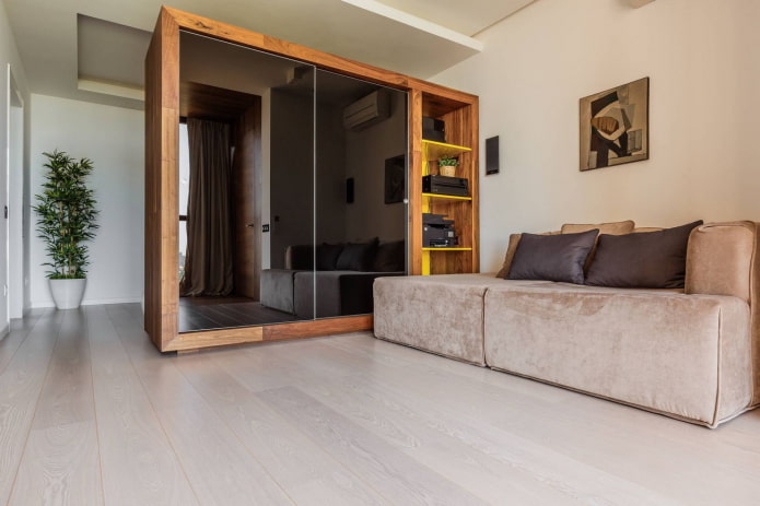 Zonage avec une armoire dans un salon