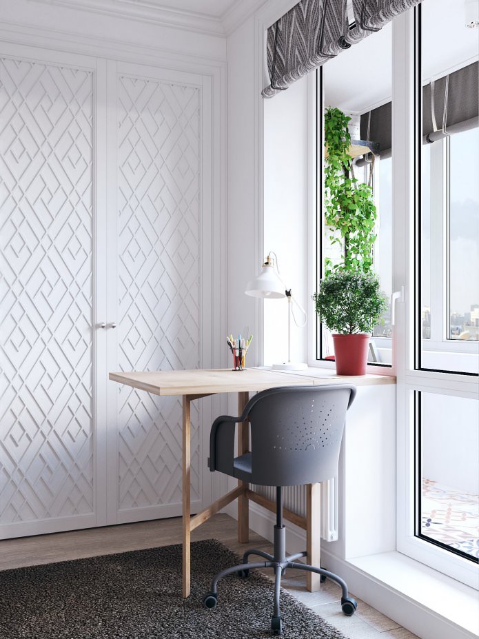 Intérieur d'un espace de travail dans un studio de 26 m²