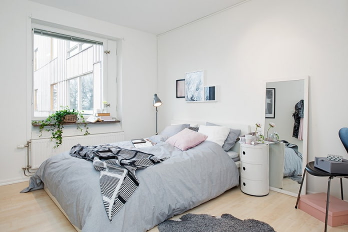 Revêtement de sol clair dans une chambre de style scandinave