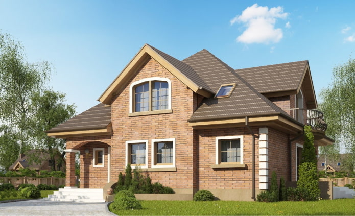maison en briques claires avec un toit marron