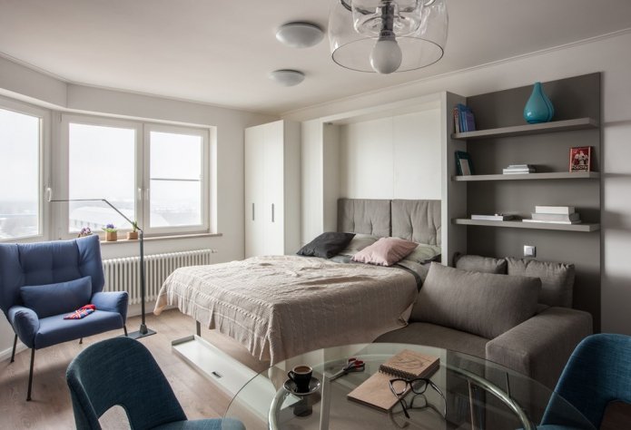 Lit transformable pliant dans le salon