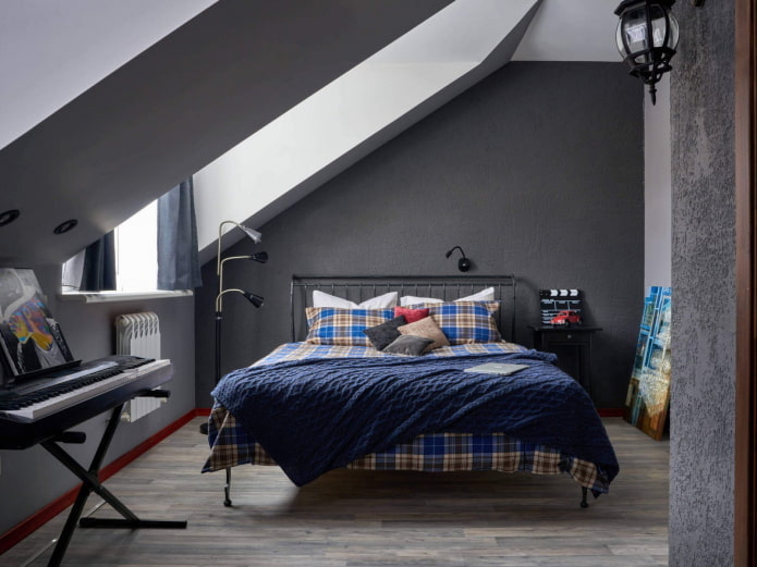 Intérieur d'une chambre mansardée pour garçon